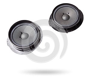 Two speakers of an acoustic system - an audio for playing music in a car interior on a white isolated background in a photo studio