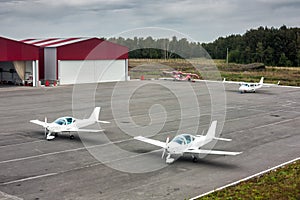 Two sports planes, one small passenger airplane and one amphibian aircraft