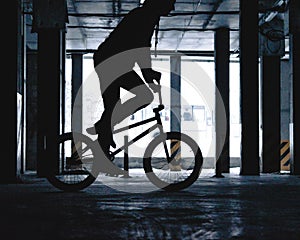 Two sportsmen silhouettes on bikes