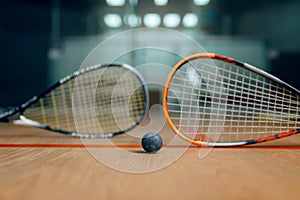 Two squash rackets and ball, game concept