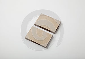 Two stack of blank craft business cards on white background with soft shadows.