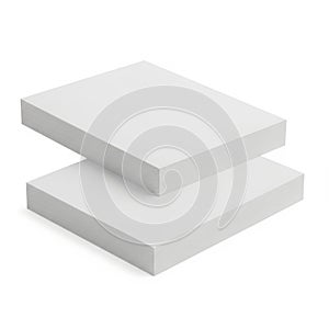 Two stacked white rectangular objects positioned at an angle against a plain background