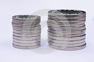 Two Stacks of Silver Coins