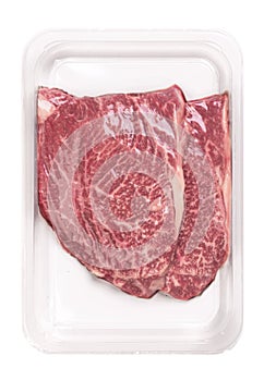 Two steaks in vacuum packaging