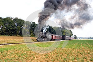 Two steam trains passing