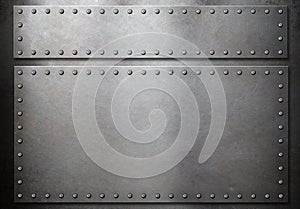 Two steel plates with rivets over metal background photo