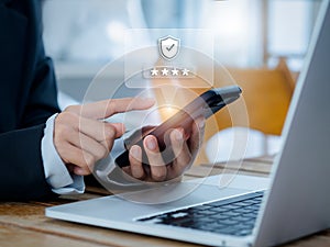 Two steps authentication 2FA concept. 2023, Shield and asterisk icons code showing on smart phone.