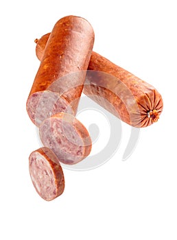 Two sticks of delicious smoked sausage in a natural shell with cut slices, isolated on a white background. Full