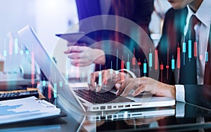 Two stock traiders making analysis of digital market and investment