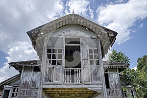 two-storey deserted malay structure cottage home.