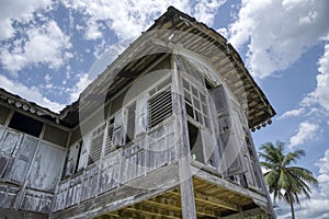 two-storey deserted malay structure cottage home.