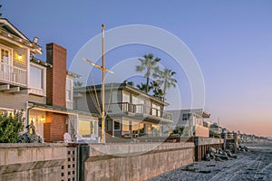 Two-storey houses along the beach at Del Mar Southern California at sunset