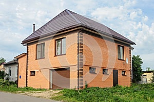 Two-storeyed orange brick house