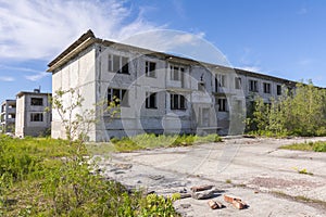 Two-story abandoned houses in the ghost town of Rudnik, Vorkuta, Russia