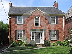 Two story brick house photo
