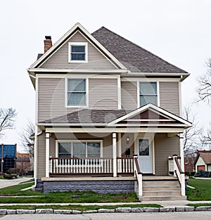 Two Story House with Spindle Porch Railing