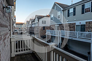 Two story low income retirement homes with the garage in the front