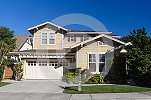 Two story single family house with driveway