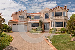 Two story single family house with driveway