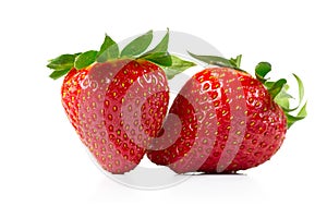 Two Strawberries isolated on a white background. Fresh organic ripe strawbery