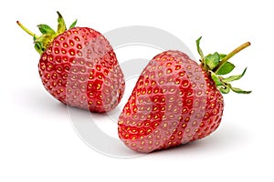 Two strawberries isolated on white background.