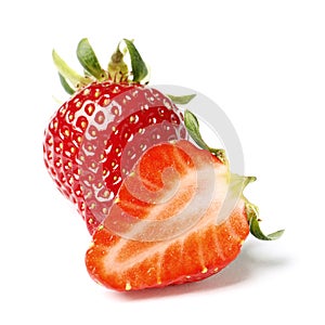 Two strawberries with strawberry leaf on white background