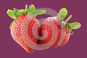 two strawberries on white red