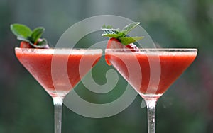 Two Strawberry daiquiri cocktail martini glass