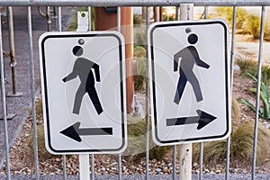 Pedestrian signs which way to go photo