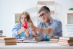 The two students checking savings to pay for education