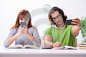 Two students in gadget dependency concept