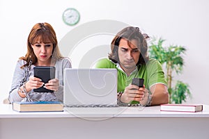 Two students in gadget dependency concept