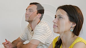 Two Students Listening to the Speaker.