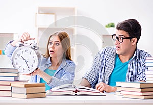 Two students runnng out of time to prepare for exams