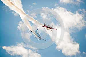 Two Stunt Planes Cross Paths