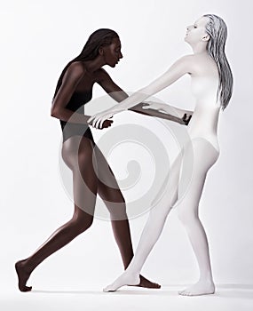 Two Styled Enigmatic Women Colored White and Brown