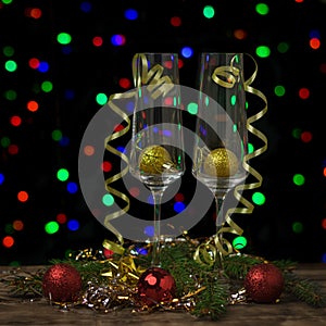 Two stylish champagne glasses with balloons and streamers on a festive background.