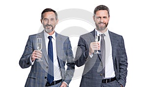 two successful businessmen partner celebrating business success with champagne