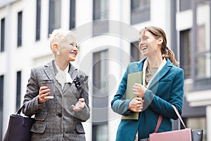 Two successful businesswomen outdoors