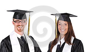 Two successful student in graduation gowns