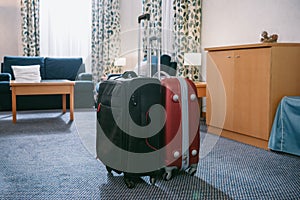 two suitcases standing in empty