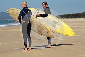 Two Surfers Looking at the Waves