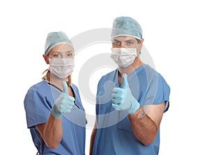 Two surgeons success thumbs up