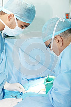 Two surgeons working