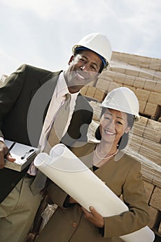Two Surveyors On Construction Site