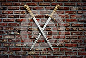 Two swords on a brick wall.