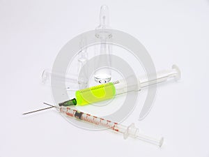 Two syringes and broken ampules