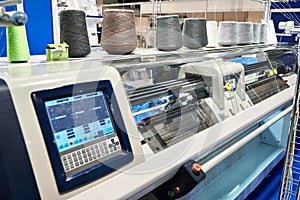 Two system flat knitting machine with one carriage