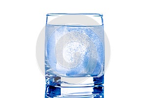 Two tablet in glass of water