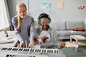 Two Talented Young Women Composing Music Together